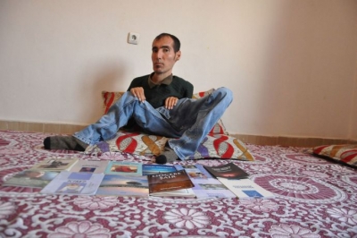 Okuryazar olmayan engelli, 12 kitap yazdı